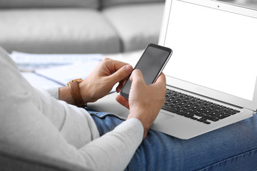 Handsome businessman working at home