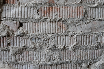 Brick cement wall texture background close up