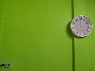 clock on green background