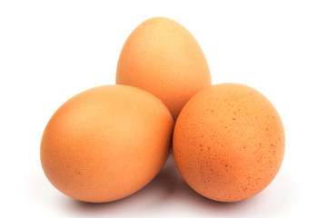 Brown chicken eggs, isolated on white background.