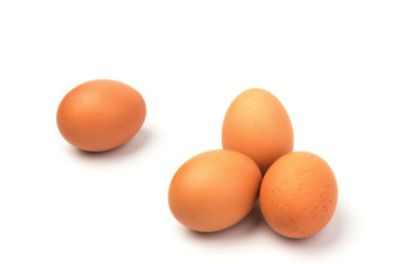 Brown chicken eggs, isolated on white background.