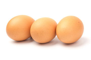 Brown chicken eggs, isolated on white background.