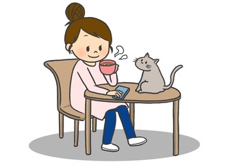 猫と一緒にのんびり過ごす人