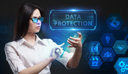 Business, Technology, Internet and network concept. Young businessman working on a virtual screen of the future and sees the inscription: Data protection