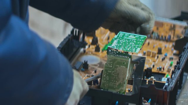 Electronic garbage disassemble for recycling at a plant.