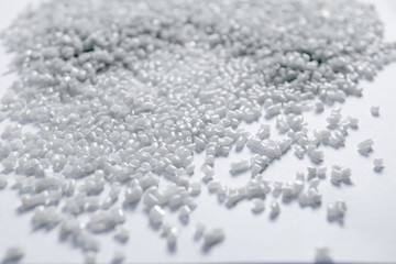 Polypropylene granule close-up background texture. plastic resin ( Masterbatch).Grey chemical...