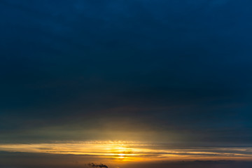 Fantastic dark thunderclouds at sunrise