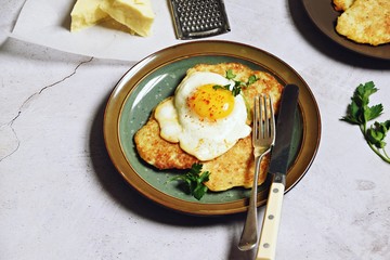 Potato pancakes with cheese and egg