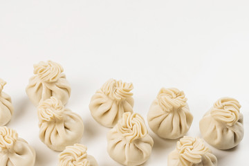 Khinkali on white background.