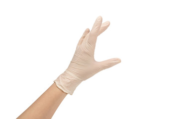 Woman puts on white rubber gloves.