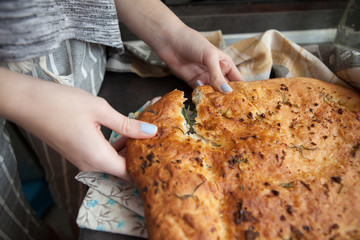 Traditional Italian Focaccia with rosemary and garlic - homemade flat bread focaccia