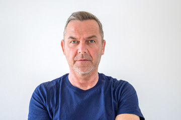 Intense focused middle-aged man with serious look
