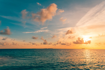 Naklejka premium Inspirational calm sea with sunset sky. Meditation ocean and sky background. Colorful horizon over the water. Sea sky horizon sunset seascape