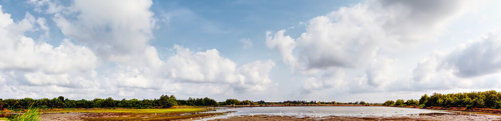 panorama landscape with river and clouds