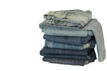 A stack of new jeans isolated on white