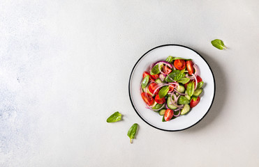 Fresh vegetable salad. Vegetarian food.Concept for a tasty and healthy meal.Top view.Copy space