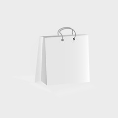 Shopping paper bag isolated on white for advertising and branding