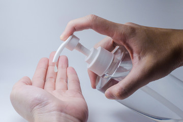 Close up people using alcohol gel cleaning gel for hands