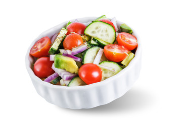 Cucumber tomato avocado red onion salad on a white isolated background