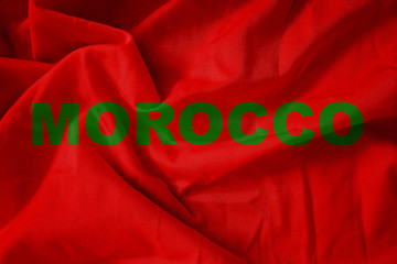 Fototapeta na wymiar Fabric texture with the Word Morocco - kingdom of Morocco