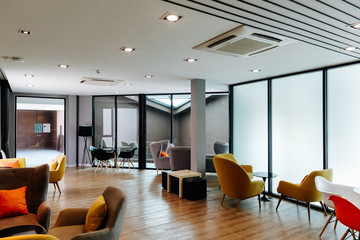 Modern multi-purpose room with bar stool