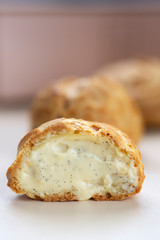 cut juicy eclair on the table