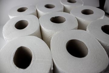 Symmetrical arrangement of the round parts of toilet paper.