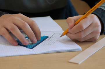 the student draws a task on descriptive geometry