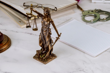 Law justice statue in lawyer with file folder law office working document