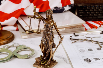 Police handcuff with crime fingerprint page file