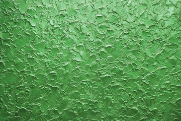 green close-up stucco wall texture background