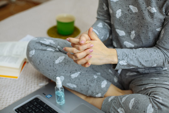 Hand washing and sanitizing due to quarantine rules. Woman's hands.