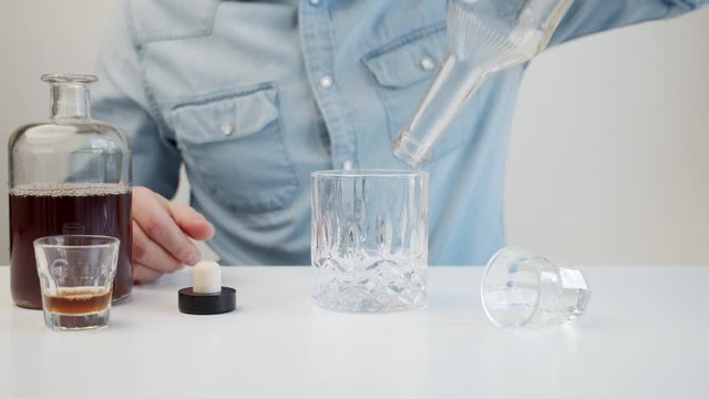 concept of alcoholism, male drinks liquor 