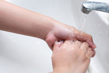 Fototapeta premium Washing Hands, Human Hand and clean water isolated background.