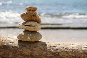 balanced stones on the beach