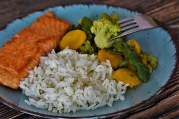 fish with rice and vegetables