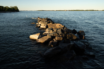 Rocks in the lake at sunset