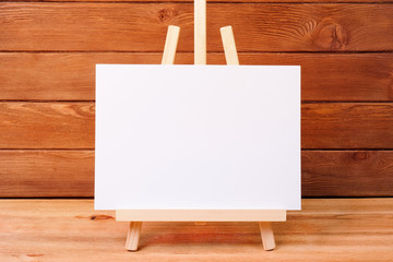 easel on a wooden table