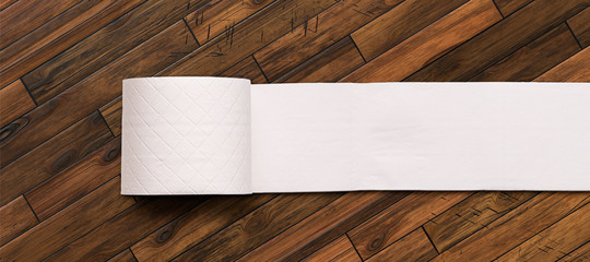 toilet paper on wooden background
