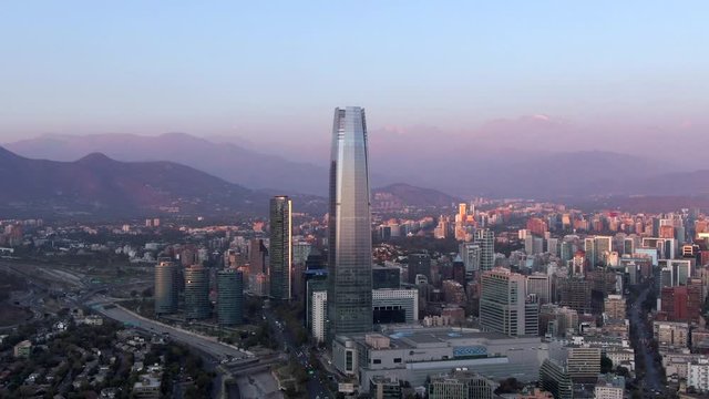 Santiago, Chile, aerial view of financial district showing landmark buildings at sunset.