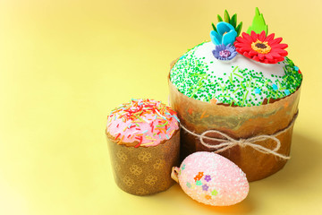 Easter cake with floral decorations and colored eggs