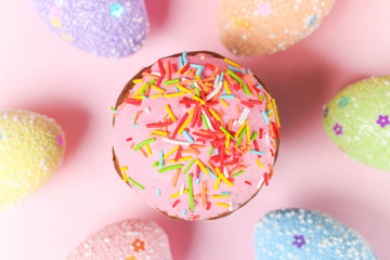 Easter cake with sprinkles and colored eggs