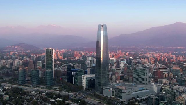 Santiago, Chile, aerial view of landmark buildings in the financial district at sunset.