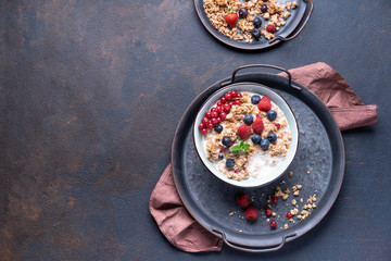 Tasty Strawberry Dessert, Homemade Yogurt with Strawberries, Granola and blueberries, raspberries and red currants. Seeds, Healthy Breakfast, Parfait in a Jar over Bright Background