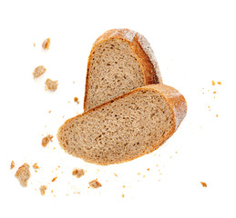 Bread slices and crumbs isolated on white background. Top view.
