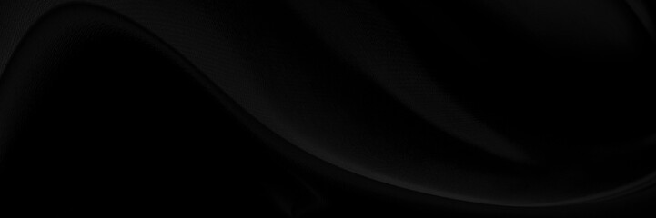 Black gray satin dark fabric texture luxurious shiny that is abstract silk cloth panorama background with patterns soft waves blur beautiful.
