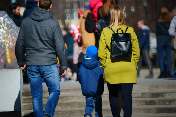 group of people walking in the city