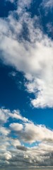 Fantastic clouds against blue sky, panorama
