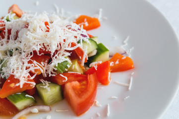 shopska salad  with tomato, cucumber, roasted pepper, onion, and bryndza cheese dressed with oil and vinegar