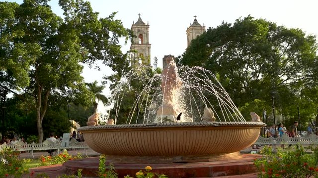 Slow motion of the water fountain in the center of the park in Valladolid, Yucatan, Mexico.